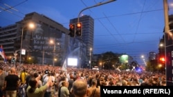 Protesters rally against violence in Belgrade on June 9.