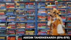 People visit the Tehran International Book Fair at Imam Khomeini Mosque in Tehran in May 2024. This year, only the virtual expo is taking place.