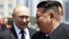 Володимир Путін (ліворуч) і лідер Північної Кореї Кім Чен Ин. Пхеньян, 19 червня 2024 року