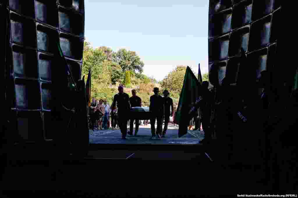 Several hundred people were on hand as her casket was transferred to the historic Baikove cemetery in Kyiv.