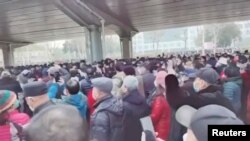 Pamje nga protestat në rrugët e Kinës.