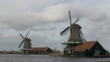 Windmills at Zaanse Schans, a village 20k from Amsterdam, only in the world that still grinds pigments for artists’ paints