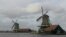 Windmills at Zaanse Schans, a village 20k from Amsterdam, only in the world that still grinds pigments for artists’ paints