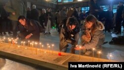 Students and professors in Belgrade pay tribute to those killed in the mass shooting in Prague.