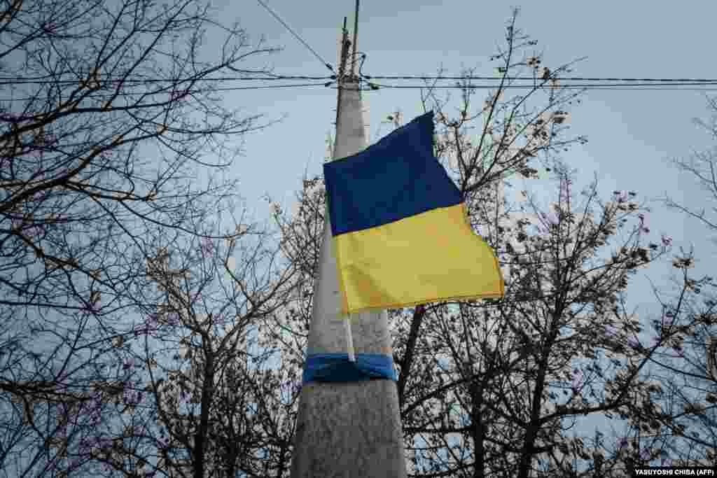 Blue-and-yellow Ukrainian flags now fly in Kupyansk after being banned last year under Russian occupation. Locals said they were forced to paint bridges in the red, white, and blue colors of the Russian flag. They have since been painted over in blue and yellow. Oleksandr Tymoshenko recalled the restrictions when the Russians were in charge. &quot;There were Russian checkpoints everywhere. They did not let you go out, but civilians weren&#39;t hurt,&quot; he said.