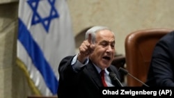 Kryeministri i Izraelit, Benjamin Netanyahu, gjatë një fjalimi në Parlamentin izraelit në maj të vitit 2023.