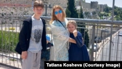 Along with her children, Tetyana Kosheva of Ukraine took refuge from the Hamas assault on Ashkelon in the corridor of her apartment building, reading on her cell phone that “terrorists have gotten into [the city], that they’ve shot people."