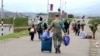 Nagorno-Karabakh - Russian peacekeepers evacuate civilians to their headquarters following Azerbaijani armed forces' offensive operation, September 21, 2023.