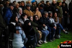 Ožalošćeni prisustvuju sahrani izraelskog vojnog komandanta, potpukovnika Tomera Grinberga, na vojnom groblju Mount Herzl u Jerusalemu, 13. decembra