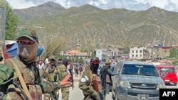 Taliban security personnel stop cars at a checkpoint in the Faizabad district of Badakhshan Province. (file photo)