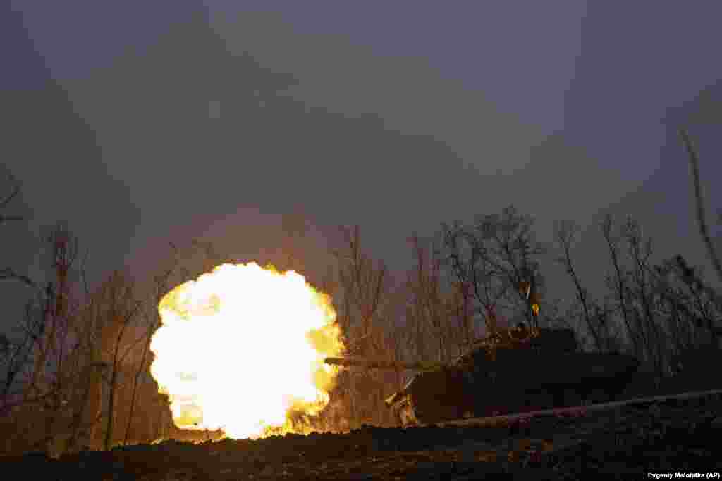 A Ukrainian tank fires toward Russian positions on the front line near Bakhmut on March 8.