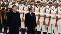 Си Дзинпин и Еманюел Макрон по време на посещение на френския президент в Китай през 2019 г.