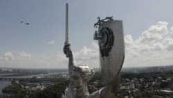 Hammer Down: Soviet Emblem Dismantled From Kyiv's Massive Motherland Monument