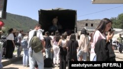 Armenia - A group of Karabakh residents arrive in Armenia, August 22, 2023.