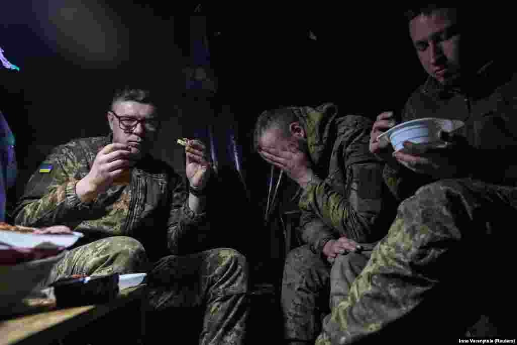 Soldiers eat and rest in their dugout. &ldquo;Sure, everyone is tired of war, physically and mentally. But imagine if we stop &mdash; what happens next?&rdquo;&nbsp;Serhiy added. &nbsp;
