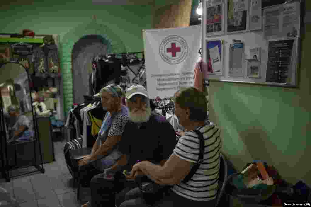 People sit inside a safe house set up by the Ukrainian Red Cross after being evacuated. Russia still controls around a fifth of Ukraine, including the Black Sea peninsula of Crimea and more than 90 percent of the Luhansk region in the east, as well as swaths of the regions of Donetsk, Zaporizhzhya, and Kherson. The occupied territory also includes most of Ukraine&#39;s coastline.