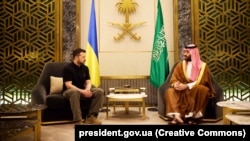 Ukrainian President Volodymyr Zelenskiy (left) meets Saudi Crown Prince Mohammed bin Salman in Jeddah on June 12.