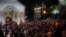 Crowds gather in front of the parliament building and near the Kashveti Church for the Easter vigil late on May 4.