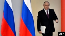 Russian President Vladimir Putin arrives to deliver his annual state-of-the-nation address in Moscow on February 29.