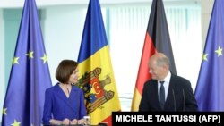 Cancelarul german, Olaf Scholz, și președinta moldoveană, Maia Sandu, susțin o conferință de presă comună la Cancelaria din Berlin, la 17 mai 2024. 