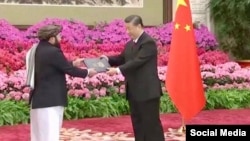 Kineski predsjednik Si Đingping i talibanski ambasador Afganistana