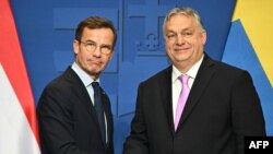Ulf Kristersson svéd és Orbán Viktor magyar miniszterelnök