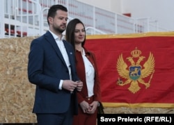 Jakov Milatovic and his wife await the election results on March 19.