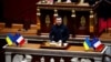 Volodymyr Zelenskiy addresses France's National Assembly as part of an official visit by the Ukrainian president on June 7, a day after 80th anniversary commemorations of D-Day. 