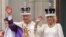 Britain's King Charles III and Britain's Queen Camilla wave from the Buckingham Palace balcony after their coronation on May 6. 