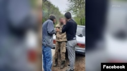 Armenia-Armenia - A screenshot of video of Syunik residents apprehending an Azerbaijani soldier, April 13, 2023.