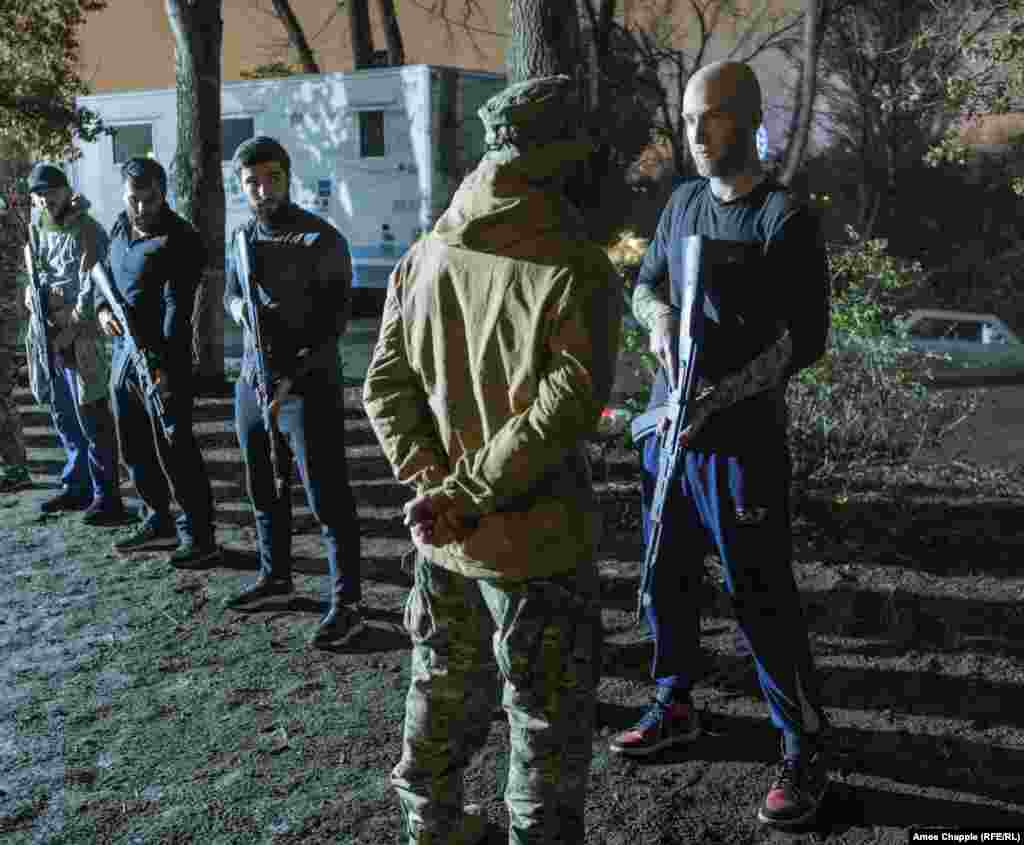 An instructor speaks with a participant of the weapons-training portion.&nbsp; VOMA was founded in 2014, initially with a focus on training outdoor survival skills.&nbsp;After a four-day conflict in Nagorno-Karabakh broke out in 2016, VOMA began training people in both survival and basic military skills. &nbsp;