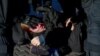 Police officers detain a man in St. Petersburg on September 24, 2022, following calls to protest against mobilization. OVD-Info focuses on the right to freedom of assembly and expression and combating political persecution in Russia.