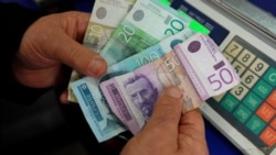 Ethnic Serbs In Kosovo Unsettled By Looming Ban On Serbian Dinar