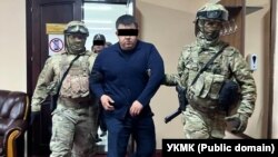 Задержание Урматбека Самаева. Фото ГКНБ КР.