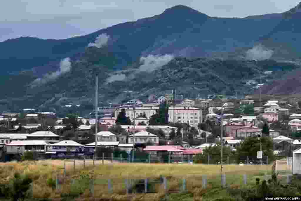 Smoke rises from artillery strikes on a hilltop outside Stepanakert.&nbsp; The UN Security Council scheduled an emergency meeting for September 21 as the international community sought ways to avoid an intensification of a long-running conflict that has already sparked two intense wars between the post-Soviet Caucasus neighbors.