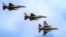 F-16 fighter jets of the Romanian Air Force perform a fly by at the Black Sea, Defense, Aerospace and Security (BSDA) international exhibition in Bucharest, Romania, May 22, 2024.