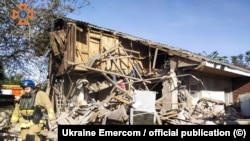 The aftermath of an alleged Russian strike in Ukraine's Kherson region on October 7. 
