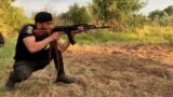 Ukraine. Abu Yunus, a Turkmen man, has been defending Ukraine since the early days of Russia's full-scale invasion. MigrantMedia