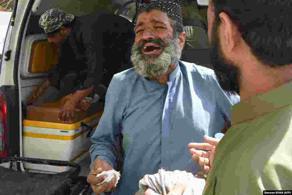 A relative mourns the death of a blast victim at a hospital in Quetta. The attack is said to have killed more than 50 people. A separate blast at a mosque in the northwestern Khyber Pakhtunkhwa Province killed at least four people. No group has yet taken responsibility for the attacks.&nbsp;