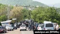 Armenia - Cars are parked on a blocked road to Kirants village, May 3, 2024.