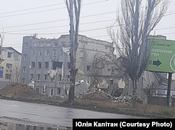 Зруйновані російськими обстрілами будинки Херсону