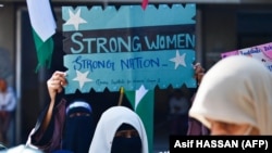 Jamaat-e Islami party activists demonstrate to mark International Women's Day in Karachi on March 8.