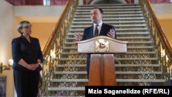 Председатель Верховного суда и Высшего совета юстиции Нино Кадагидзе и премьер Грузии Ираклий Гарибашвили