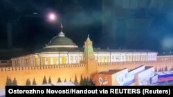 A still image taken from video shows a flying object approaching the dome of the Kremlin building during the alleged Ukrainian drone attack in Moscow on May 3.