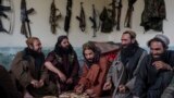 -- Taliban fighters enjoy lunch inside an adobe house that is used as a makeshift checkpoint in Wardak province, Afghanistan, Thursday June 22, 2023.Daily Life