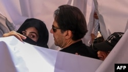 Former Pakistani Prime Minister Imran Khan and his wife, Bushra Bibi (file photo)