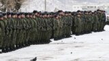 Russian soldiers attend a ceremony marking the end of combat training for mobilized men in the Eastern Military District on October 31.