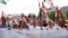 Peter Magyar (center) leads an anti-government protest in Budapest on April 6.