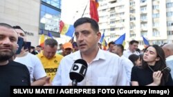 George Simion, liderul AUR - formațiunea care riscă o amendă consistentă din cauza unei breșe de securitate a aplicației partidului.