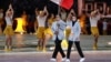 ناهید کیانی و جواد فروغی پیشاپیش تیم ایران در افتتاحیه بازی‌های آسیایی هانگژو